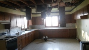 Extensive water damage to the kitchen resulting from frozen water pipes.