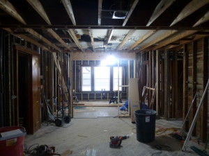 Al the plaster was removed from the walls exposing the framing throughout the home.