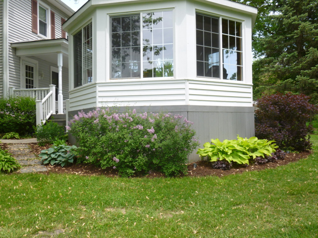 All sides of the gazebo compliment the customer's home and deck.